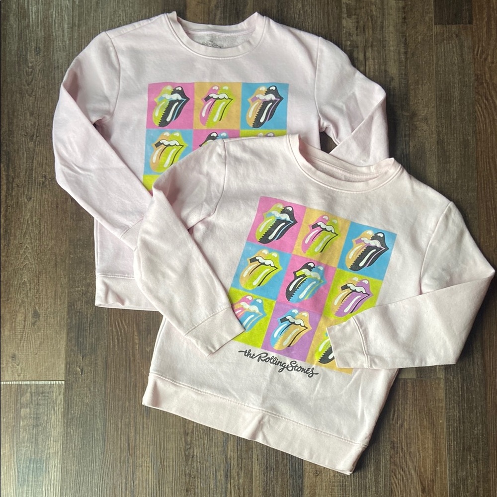Pair of The Rolling Stones Light Pink Graphic Crewneck pullovers (s and m)